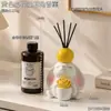 Adorno aromático con forma de conejo de orejas caídas sosteniendo una flor, con portavelas, adecuado para dormitorio, escritorio y decoración del hogar, creando una atmósfera acogedora, una gran decoración de regalo para el hogar