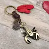 Colgante de Coche Tejido Hecho a Mano Punk Llavero de Cuero Retro Aleación Camarón Accesorios Populares de Comercio Electrónico Transfronterizo