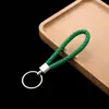 Chaveiro de corda de couro pingente de carro acessórios corda de chave de corda de couro trançado pu para empurrar pequenos presentes fabricantes atacado
