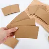 Fundas personalizadas desechables para tazas de café para bebidas calientes y frías, fundas corrugadas para tazas, fundas de papel kraft desechables para té de leche anti-quemaduras espesadas