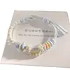Pulsera de Doble Capa Flor de Durazno Doble Nudo Pulsera Tejida a Mano Xiaohongshu Cuentas Portables Passepartout Dorado Cuentas de Transferencia