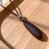 Diseño único minimalista colgante de gota de agua de metal collar largo con un ambiente de alta gama, fresco, accesorio de cadena para suéter con cordón de cuero para mujer