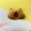 Muñeco de peluche creativo de dibujos animados, gato garabato, lindo broche, bolso de conejo, colgante, bufanda, calcetines, accesorios para el cabello