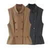 Ropa de otoño para mujer estilo europeo y americano 2026: falda corta de nueve puntos abotonada con dobladillo y top sin mangas 6450