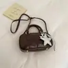 Bolsa de Mão Retro para o Dia a Dia Bolsa de Boliche para Mulheres 2026 Verão Nova Simples Estilo Coreano de Alto Valor Bolsa de Ombro Único Transversal