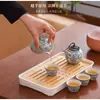 Juego de Té de Viaje de Cerámica Ru de Alta Gama para Exteriores Oficina Portátil Taza de Infusión Rápida Una Tetera Tres Tazas con Recipiente para Té