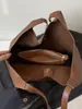 Bolso de hombro grande de moda coreana simple y elegante para mujer, capacidad grande, nuevo para Otoño 2026, para el trabajo diario.