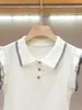 Shenzhen Nanyou Ropa de Mujer de Gama Alta Verano Nuevo Estilo Universitario Coreano Reductor de Edad en Línea Top de Punto con Bloques de Color y Mangas de Volantes