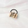 Venta Caliente Transfronteriza Distintivo Metal Cepillado Banda de Cuero Paquete de Cabello Ondulado Alto Grado Femenino Aleación Anillo para el Cabello Femenino Anillo para Cola de Caballo Femenina