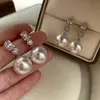 Pendientes de Perla Elegantes de Nicho para Mujer Lujo Ligero Versátiles Tachuelas de Oreja de Gama Alta Nuevas Explosiones Tachuelas de Diamante para Mujer Tachuelas de Oreja de Gama Alta