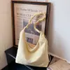 Bolso Tote de Diseño Nicho Estilo Coreano para Mujer Primavera 2026 Nuevo Gran Capacidad Moderno Bolso de Hombro para Viajes Diarios para Estudiantes Universitarios