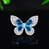 Moda Coreana 2025 Exquisito Broche Pequeño Lujo Ligero de Gama Alta Flor Mariposa Ramillete Pequeño Combinación Versátil Pin Antideslizante