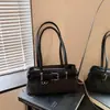 Bolso de lunares a la moda, modelo nuevo y simple, bolso de hombro único de nicho de moda para el día a día, versión coreana 2026, bolso de axila para mujer con diseño elegante