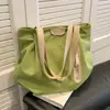 Bolsa de lona feminina de grande capacidade, nova bolsa de ombro versátil de verão 2026, bolsa tote de balde plissada texturizada para o dia a dia