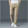 Pantalones casuales de verano para hombre, corte holgado, cintura elástica, pierna recta largos, pantalones de traje negros para primavera y otoño, estilo seda de hielo ultradelgada