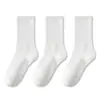 Meias femininas para primavera e outono, feitas de fio de algodão puro, comprimento até a panturrilha, brancas, absorventes de suor, resistentes a odores e antibacterianas, adequadas para uso em negócios e esportes.