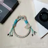 Lanyard de teléfono colorido tejido a mano, correa de muñeca de estilo étnico, cordón anti-pérdida con borla y cuenta, adorno colgante para funda de teléfono, venta al por mayor