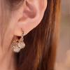 Pendientes de perlas con diseño de lujo y luz de aguja plateada, estilo coreano, elegantes, nuevos y con explosiones, de nicho.
