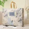 Tecido não tecido revestido colcha de verão bolsa de mão chapéu de cama conjunto de quatro peças colcha de ar condicionado bolsa de botão universal bolsa de celebração vermelha
