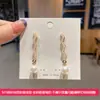 Pendientes combinables puesto de mercado nocturno al por mayor Corea del Sur pendientes explosivos simples diseño de nicho femenino pendientes de moda con temperamento