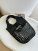 Bolso tejido de paja de moda al por mayor de fábrica, bolso tejido hueco de moda, bolso de playa estilo ins, bolso de hombro, bolso de paja debajo del brazo