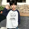 Camiseta de manga larga 100% algodón para niño, colección de primavera y otoño, diseño color block, cuello redondo, estilo nuevo para principios de otoño, mangas largas raglán