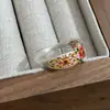 Nuevo Anillo Estilo Palacio Chino Esmalte Flor de Cuatro Hojas para Mujer Lujo Ligero Gama Alta Diseño de Nicho Anillo Ajustable