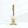 Capa de Chuva Amarela Urso de Pelúcia Pingente Bolsa Charme Chaveiro Boneco de Casal Acessório Presente de Aniversário