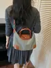 Bolso de mano de paja versátil de moda transfronterizo para mujer, nuevo bolso de hombro cruzado de gran capacidad informal para el verano de 2026