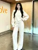 Nuevo Conjunto de Dos Piezas de Punto para Mujer Otoño 2026: Suéter de Cuello Redondo Casual Holgado y Pantalones de Pierna Ancha a la Moda Versátil