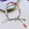 Suministro de fábrica nueva pulsera china retro de tinta bambú pulsera con borla de cuentas de mariposa pulsera de estudiante personalizada