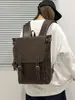 Mochila de Hombro Doble de Cuero PU Retro Transfronteriza para Hombres y Mujeres Diseño de Solapa Estilo Coreano Mochila Simple para Estudiantes Mochila para Computadora de Viaje