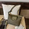 Bolsa de ombro de alta qualidade Dongdaemun coreana transfronteiriça, bolsa de mão minimalista retrô da moda, bolsa de axila com textura de camurça