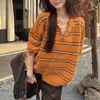 Suéter de punto suelto casual para mujer, a rayas y con bloques de color, manga larga, amigable con la piel, nuevo diseño de nicho Otoño/Invierno con cuello de solapa