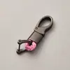 Directo de fábrica llavero de cuerda tejida accesorios de ferretería hebilla de herradura colgante para llave de coche accesorios de coche de moda