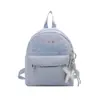 Mochila escolar de moda 2026, mochila de gran capacidad para estudiantes universitarios, nueva bolsa de verano con estampado de letras, bolso de lona para mujer