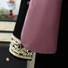 Nuevo conjunto de chaleco de otoño estilo chino para madres, nueva moda trendy 2026 para mujeres de mediana edad y mayores, elegante conjunto de tres piezas estilo nacional para dama