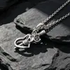 Joyería al por mayor cuerno feliz cara sonriente cabeza de diablo colgante cabeza de fantasma acero de titanio collar colgante colgante una generación de SP243