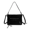 Bolso de mujer de alta gama, nuevo para la primavera de 2026, bolso de axila para el trabajo, bolso de hombro cruzado con diseño de nicho, moderno y simple