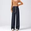 Tejido suave y flexible tipo mezclilla sintética forrado de polar para otoño e invierno cintura alta elegantes rectos adelgazantes versátiles pantalones estrechos de pierna ancha para mujer