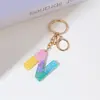 Llavero de Borla con Letra Inglesa de Colores Arcoíris de Resina Colgante de Cristal Epoxy de Alta Gama Accesorio de Joyería