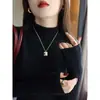 Camiseta base de punto de cachemira para mujer con cuello medio alto, popular nuevo estilo otoño e invierno 2026, top de punto de alta gama