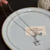 Collar de Cadena para Clavícula con Colgante de Anillo de Carrera de Estrella de Cinco Puntas Micro-Pavimentado Dulce Coreano Nuevo 2025 Estilo de Nicho de Gama Alta