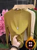 Camiseta Base de Cuello Medio Alto para Otoño e Invierno para Mujer 2026 Nuevo Mousse Cepillado Más Terciopelo Ajuste Delgado Cálido Nicho Ropa Interior Superior