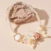 Collar de concha de resina estilo vacacional con flores geométricas y perlas artificiales para la clavícula, personalidad temperamento europeo y americano, collar de alta calidad para mujer