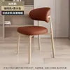 Cadeira de jantar de madeira de imitação de estilo nórdico em casa moderna simples Internet popular hotel restaurante leve luxo macio bolsa encosto cadeira cadeira de ferro forjado