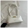 Bolso de hombro versátil de color liso vintage, diseño de nicho de lujo ligero de alta gama, bolso de mano simple y elegante, bolso de axila estilo francés