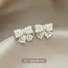 2026 Nuevos Pendientes de Tachuela de Dama Gentil de Moda Estilo Dulce Pendientes de Perla Moda Exquisitos Accesorios de Pendientes de Lazo Venta al por Mayor