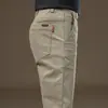 Pantalones casuales negros de alta gama para hombre, nuevos, corte slim, corte recto, elásticos, versátiles, pantalones de vestir sencillos para primavera y otoño