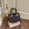 Bonita Xiaomi Home 2026 Nova Bolsa de Mão Casual Elegante Tendência Alta Aparência Versão Coreana Retrô Ombro Único Transversal Pequena Quadrada Feminina